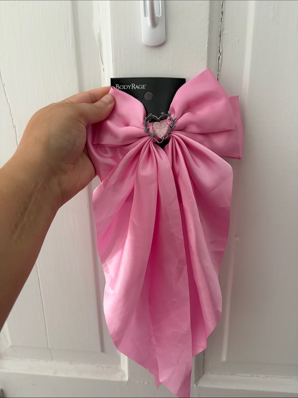 Spencer's Pink Satin Bow with Heart Charm